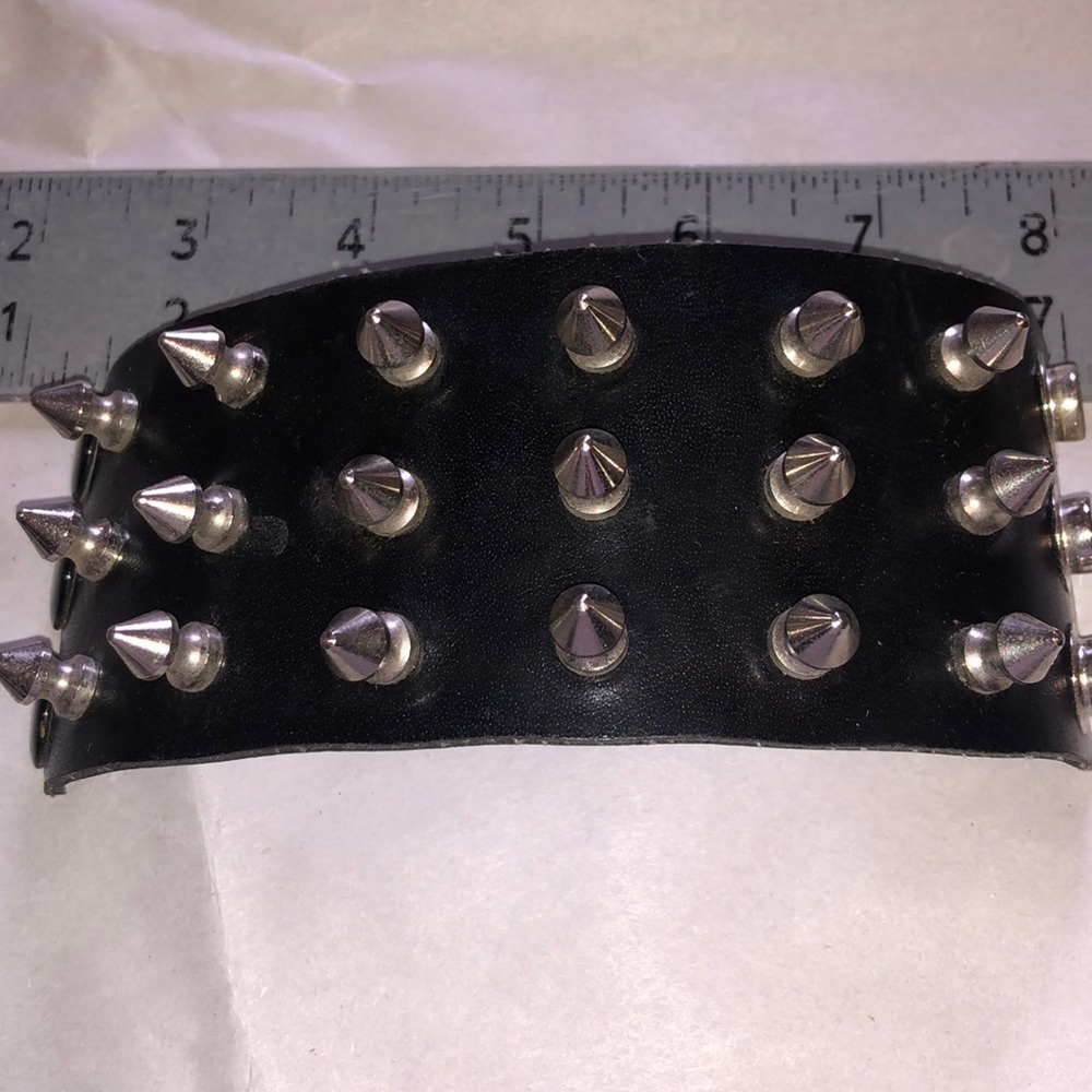 3 for $11 black triple row spike bracelet.